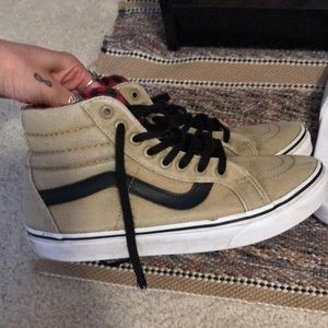 Tan & black high top vans